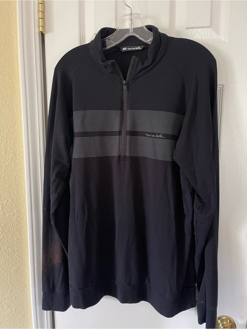 Travis Mathew Men's Black Zip-Front Performance Pullover with Subtle Stripe